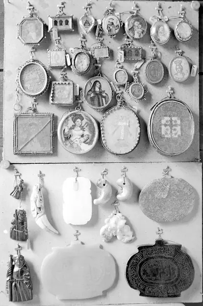 2 groups of Catholic pilgrimage medals & Spanish amulets.