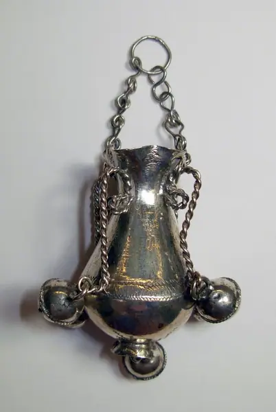 Child's silver amulet ( cascabelera ) shaped like a vase, with pendant bells, Andujar (Spain), 1865-1870