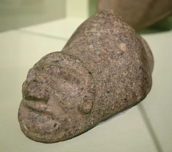 Three-pointed sculpture with carved face (zimi), Taino Culture, Puerto Rico, c. 1000-1494 AD, stone