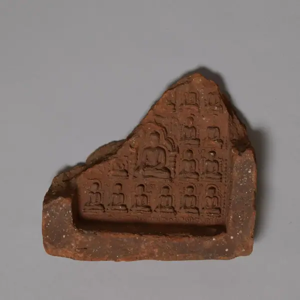 Fragment of votive tablet showing Buddhas, terracotta, from the Kyaukku Ohnmin Temple at Pagan, Burma, probabl