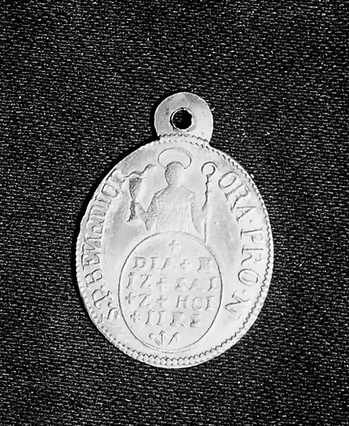 St. Benedict's penny. On one side a representation of the Saint.