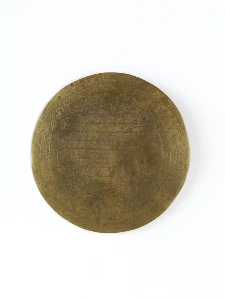 Round brass plaque