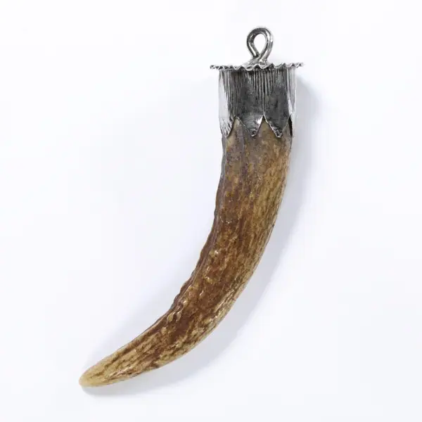 Amulet of stag's antler mounted in silver, Spain, 1800-1899