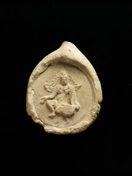 Carved votive seal
