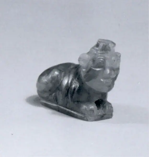 Lion amulet with human head