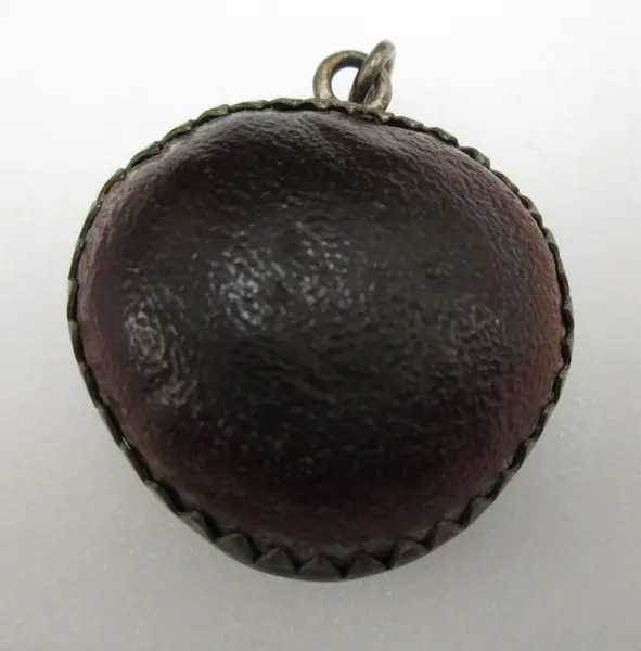 Sea-bean (Mucuna) amulet set in a silver mount, Seville (Spain), 1800-1899