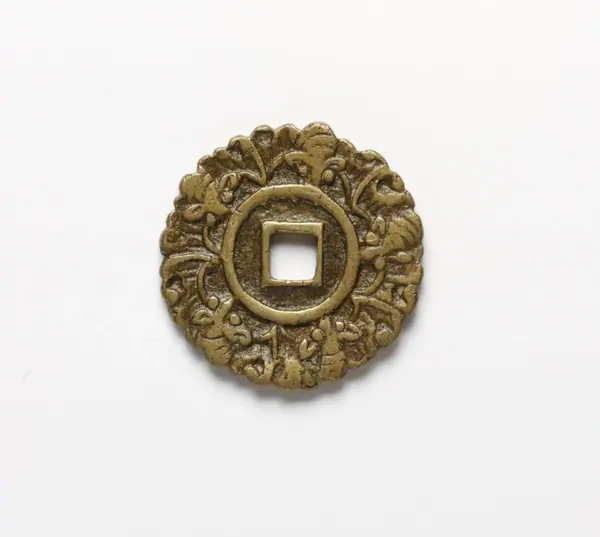 Coin charm, cast and pierced brass, Korea, Late Joseon dynasty, 1850-1900