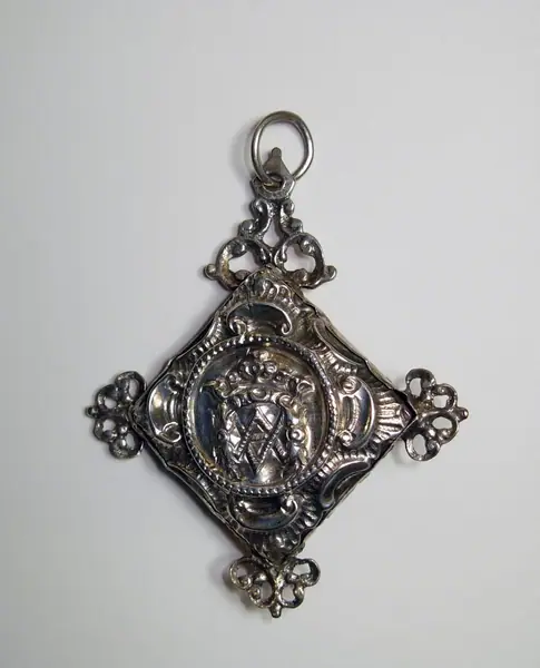 Lozenge-shaped silver amulet case with Christian symbols, Cordoba (Spain), 1865-1870