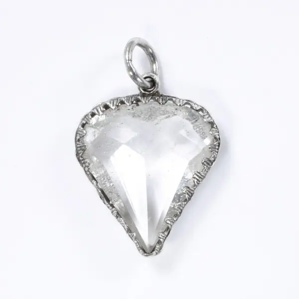 Heart-shaped amulet of rock crystal (Schreckstein) mounted in silver, Bavaria (South Germany), around 1800