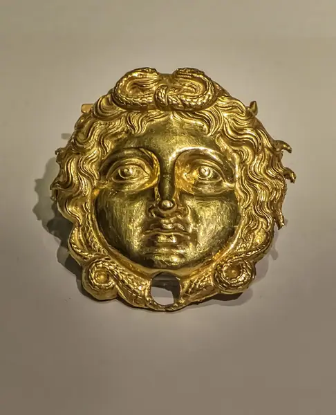 Gold Gorgon Head from the Cuirass (Breastplate) of Philip II of Macedon tomb at Aigai, Vergina Greece 4th century BCE