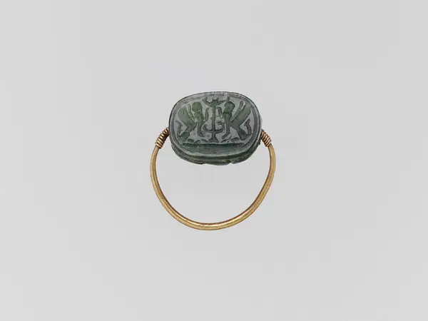 Gold hoop with plasma scarab