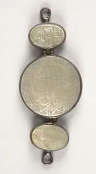 Armband (bāzūband) of three amulets