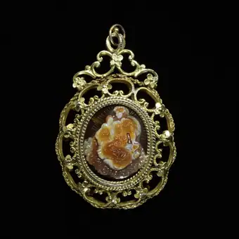 Reliquary pendant in the form of an onyx cameo of the Virgin and Child, set in silver-gilt openwork, Spain, ea