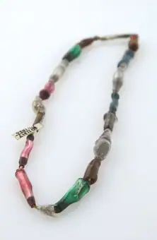 An amuletic necklace worn to cure sore throats, London.