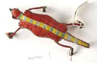 Sioux Indian amulet in the form of a turtle, worn by girls to ward off illness. Said to contain the umbilical cord of the wearer. Decorated in quills. Northern Plains