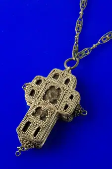 Amulet, carved cross of yew wood with representations of Chr