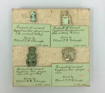 Isis and Horus amulet, blue-green glazed composition, Egypt, Late Period