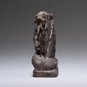 Cippus (magical stela) where Pataikos replaces Horus on the crocodiles and is flanked by Isis and Nephthys