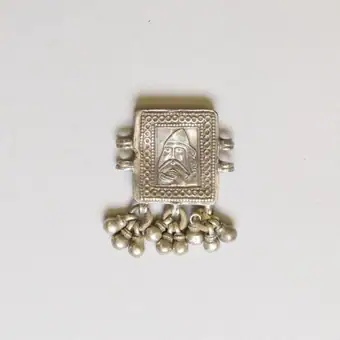 Silver amulet, central part of a bazuband