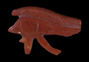Wedjat eye amulet, carnelian, Egypt, possibly Late or Ptolemaic Period