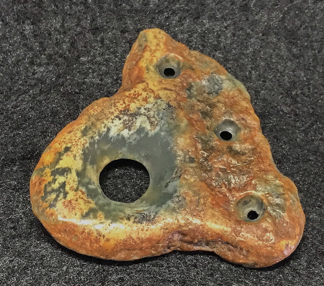 Neolithic river-jade amulet