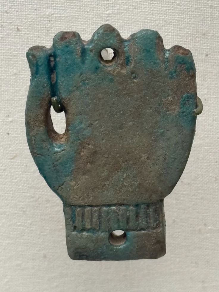 An amulet in the form of a hand