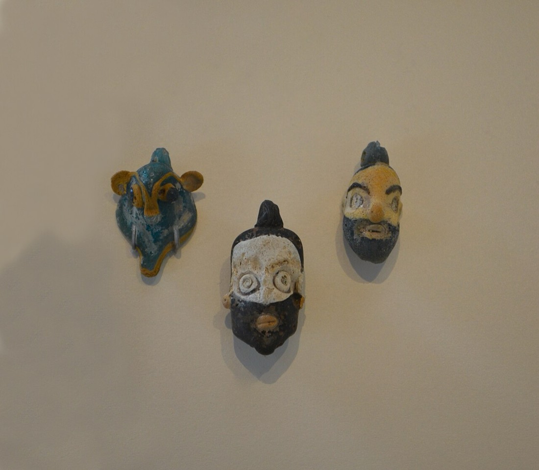 Punic glass-paste pendants