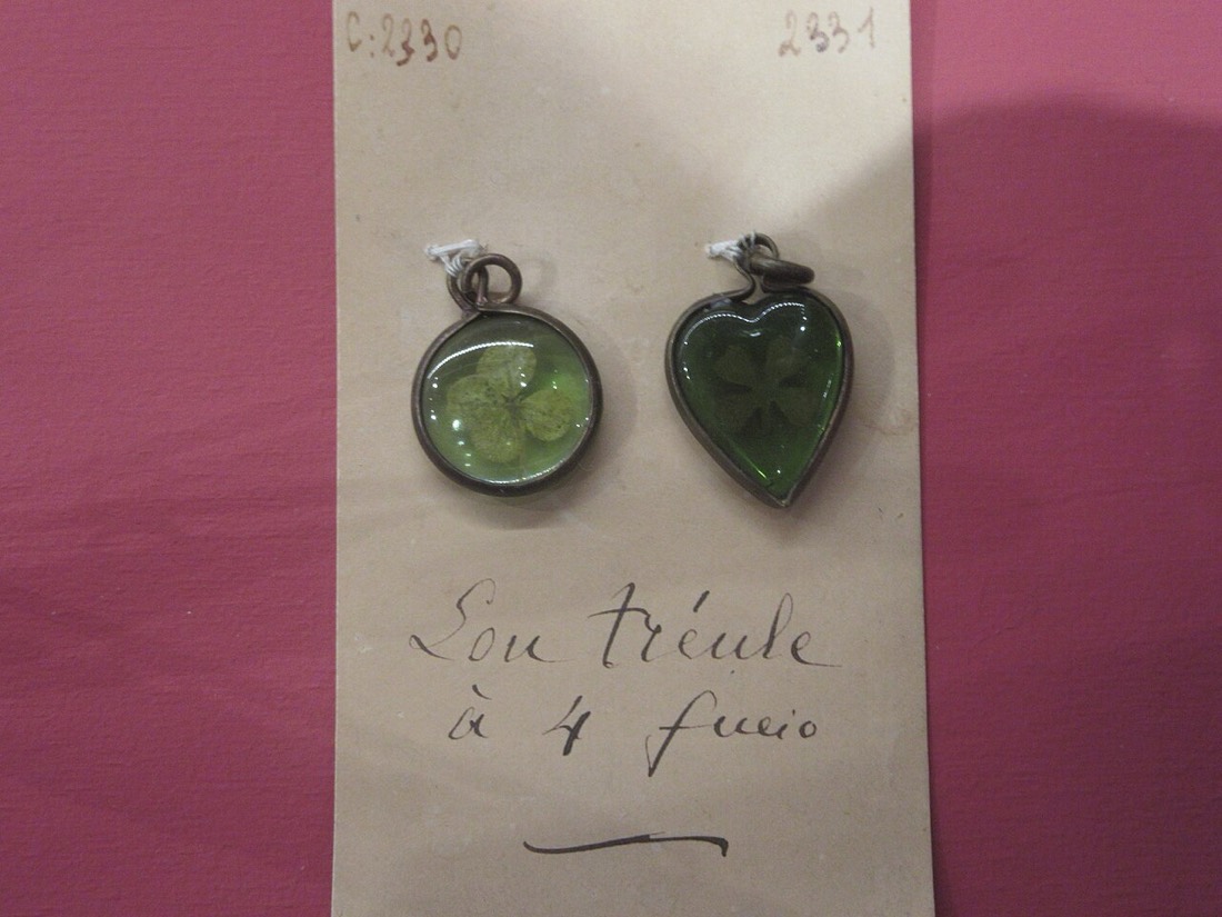 A four-leaf clover, cased