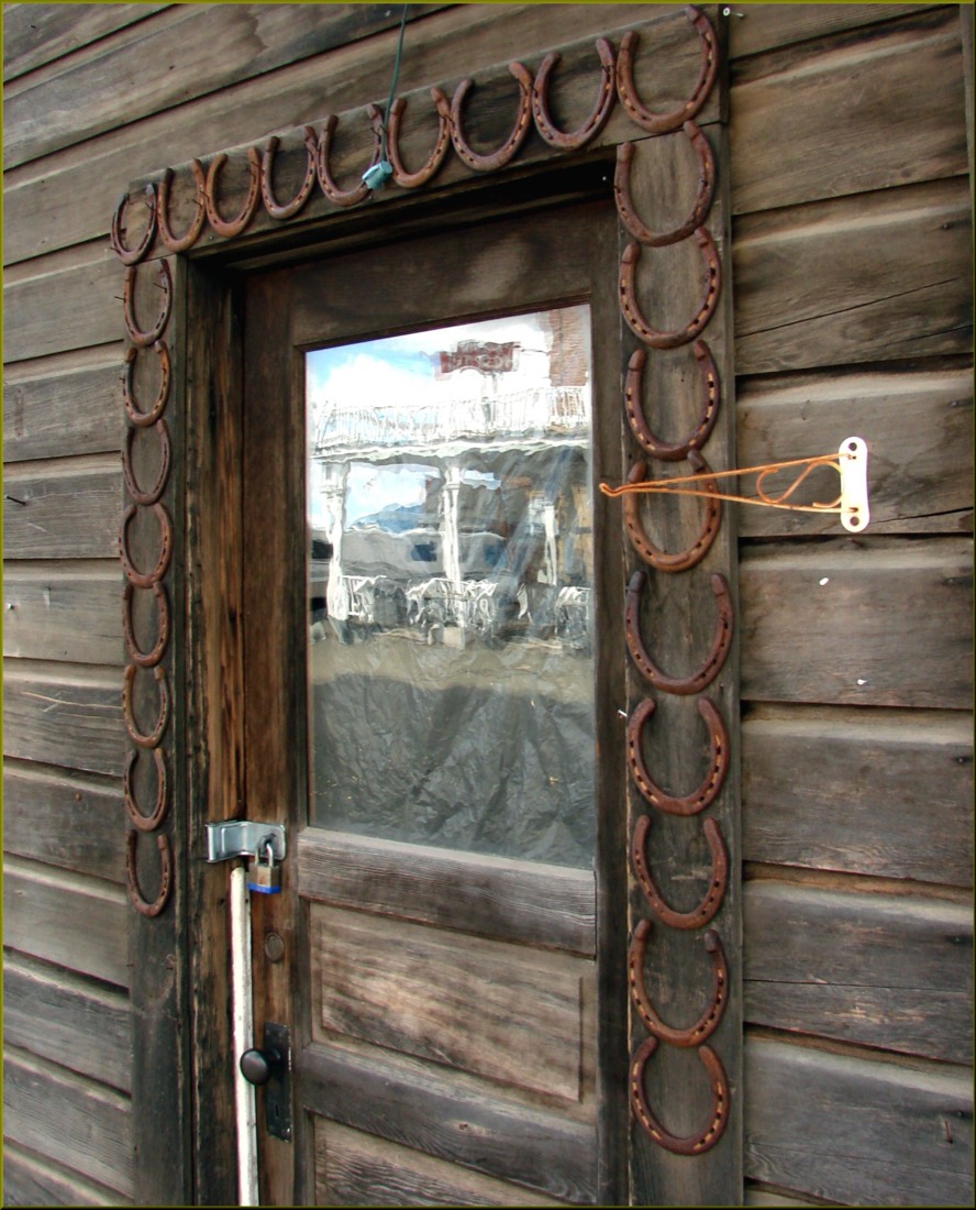 A door armed with horseshoes